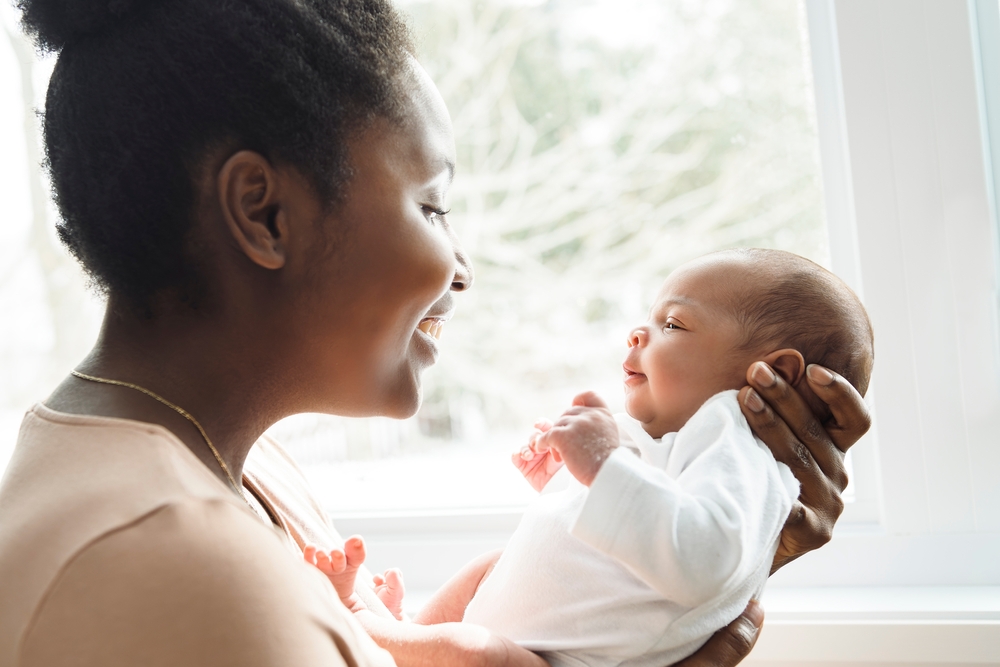 Black mother and her baby