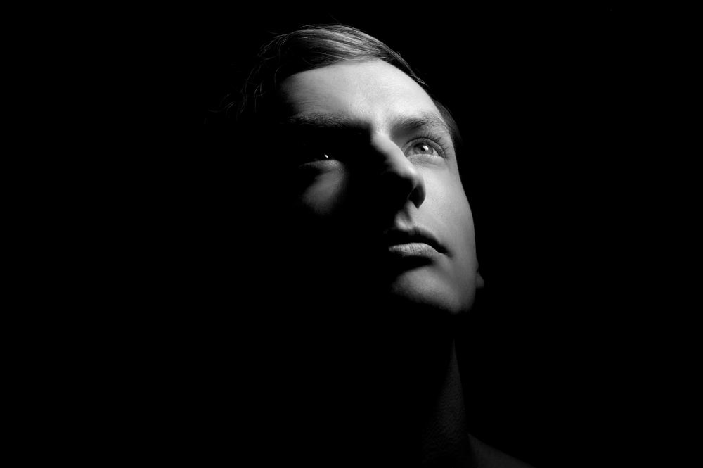 Dramatic portrait of a young man BW