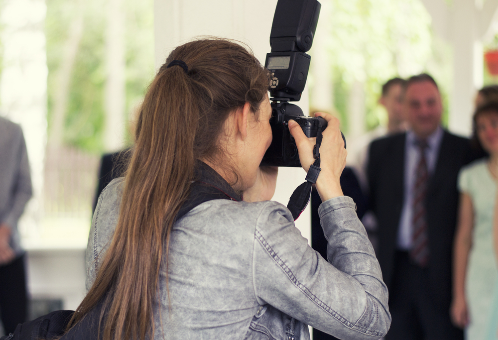 event photographer with flash