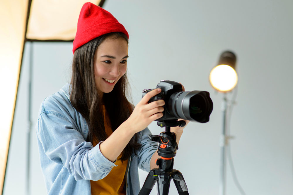 female photographer with camera