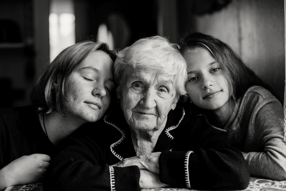 Granddaughters with grandmother BW