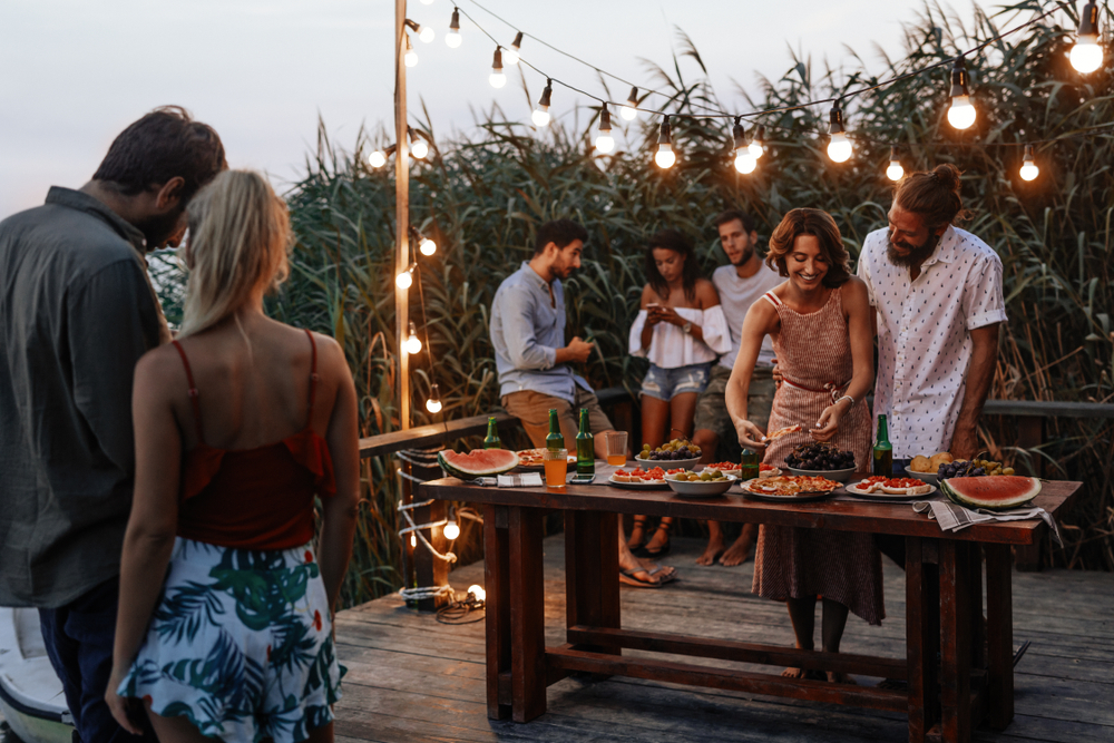 Group of friends having a party outside