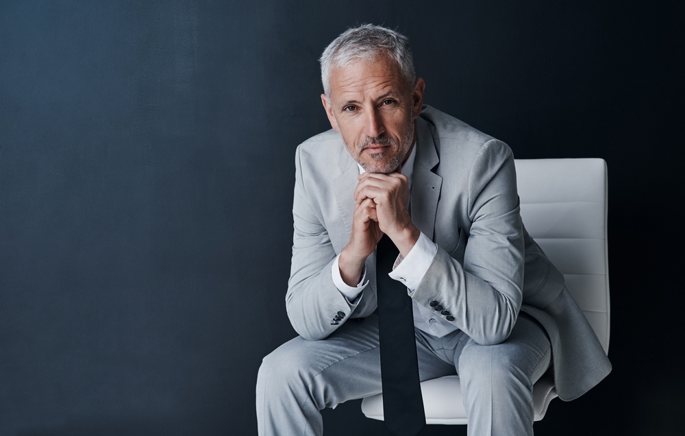 Man sitting leaning forward