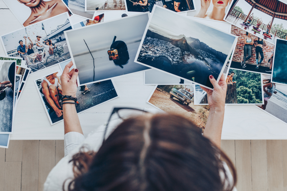 photographer checking prints