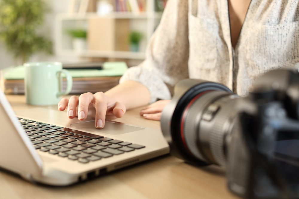 photographer using a laptop