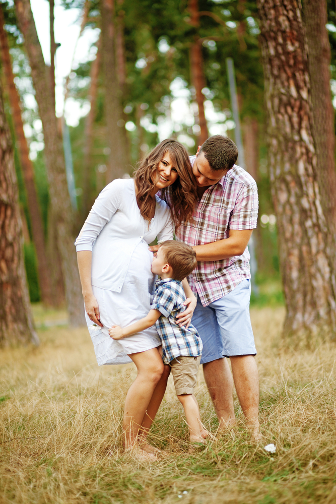 Pregnant mother with her family